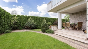 Modern house with beauty garden and terrace